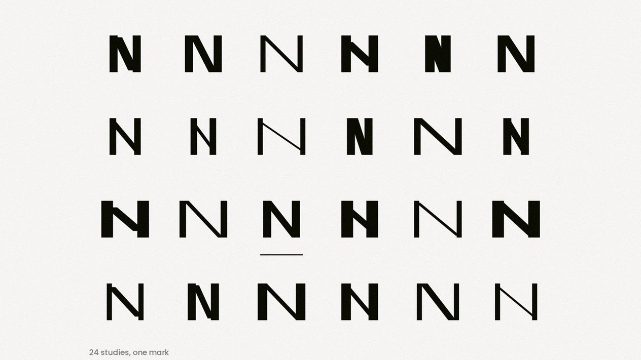 Twenty-four studies of the same letter N drawn different ways in a grid, with one of them marked as chosen.